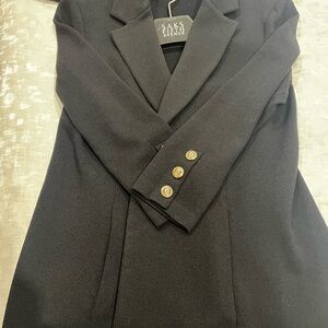 Saks Fifth Avenue St John Caviar suit with wide leg pants.